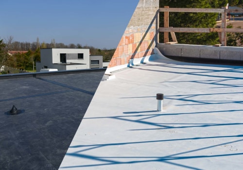 Choosing Between TPO and EPDM for Your Flat Roof Replacement